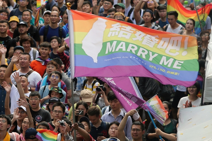 今年5月，台湾以专法合法化同性婚姻。