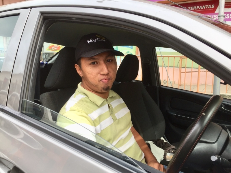 莫哈末阿里夫担任全职司机已逾1个月，乘客反应理想。