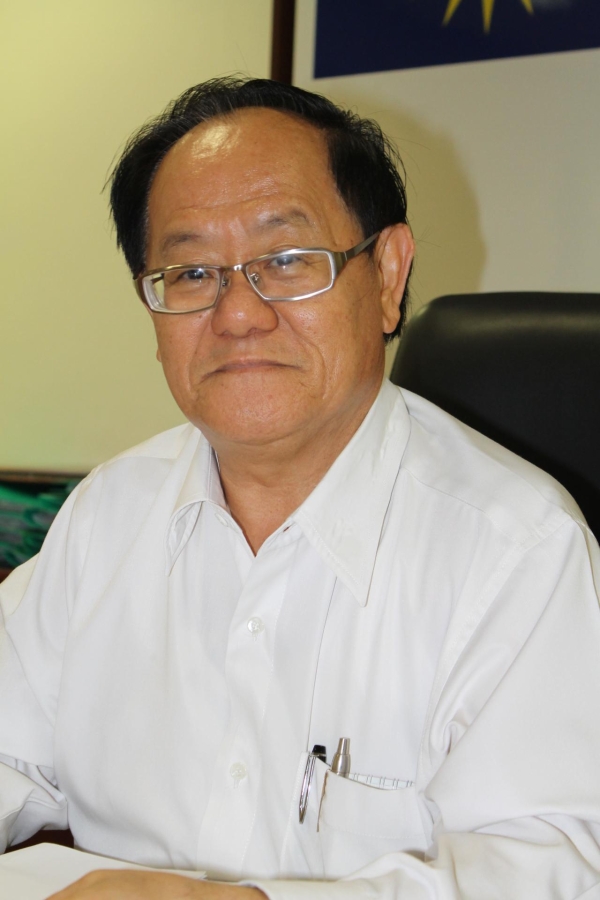 拿督邓诗汉（万挠爱美乐华小董事长）