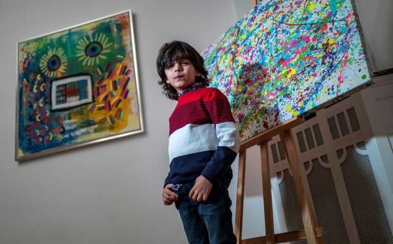 Mikail Akar, 7, has taken the German art world by storm. Photo courtesy: AFP