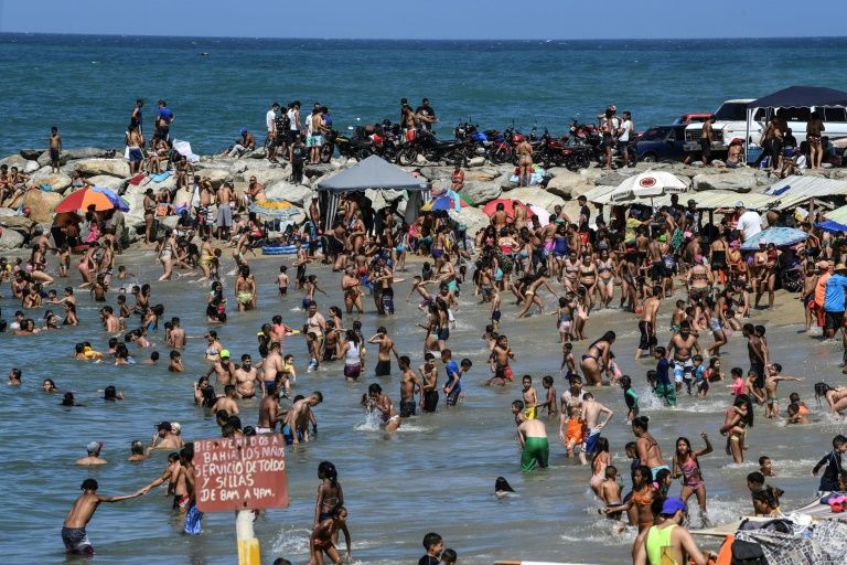 People enjoy Bahia de los Ninos beach in La Guaira. Photo courtesy: AFP