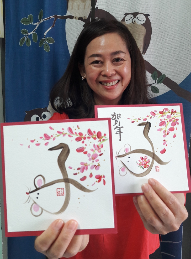 刘金婷配合庚子鼠年的到来，设计了多款以“子”、“老鼠”为主题的新年贺卡。