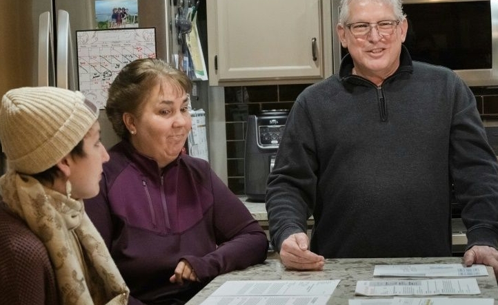 Olivia, Cathy and Dan Maccoux sit around the dining table in the family's Minneapolis home. AFP Olivia, Cathy and Dan Maccoux sit around the dining table in the family's Minneapolis home. AFP