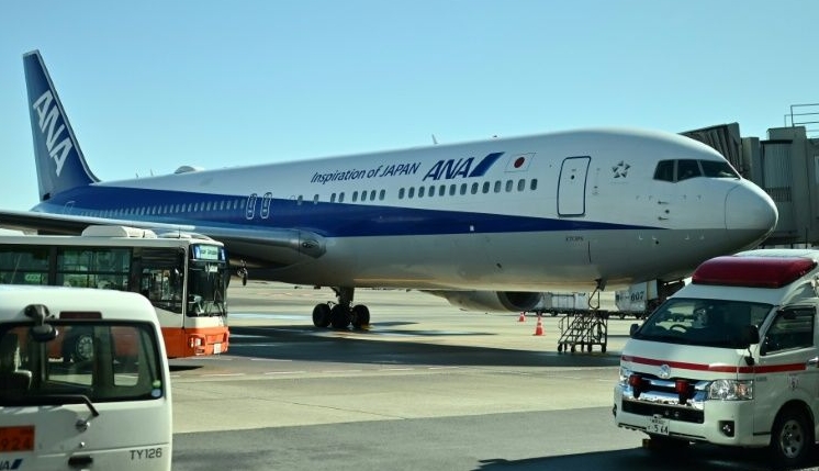 Japan's first charter flight with 206 people arriving in Tokyo from Wuhan on Wednesday morning. AFP Japan's first charter flight with 206 people arriving in Tokyo from Wuhan on Wednesday morning. AFP