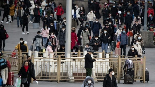 Neighborhoods in China have ramped up checks on residents returning from virus-hit Hubei province. AFP Neighborhoods in China have ramped up checks on residents returning from virus-hit Hubei province. AFP