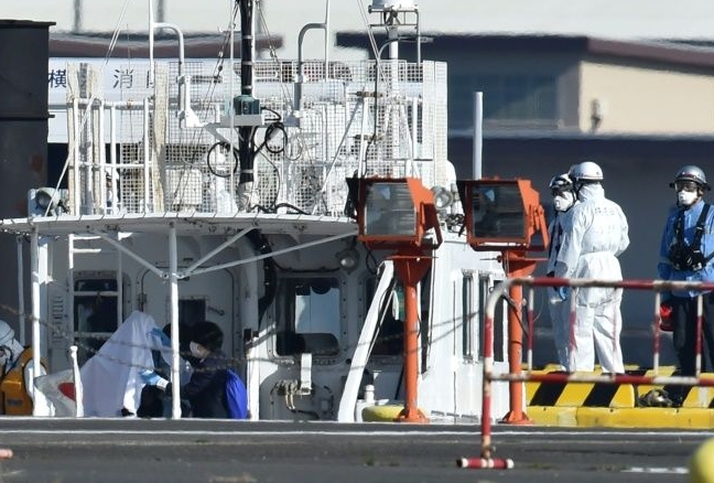 Ten people have been diagnosed with novel coronavirus onboard a quarantined cruise ship off Japan's coast. AFP Ten people have been diagnosed with novel coronavirus onboard a quarantined cruise ship off Japan's coast. AFP