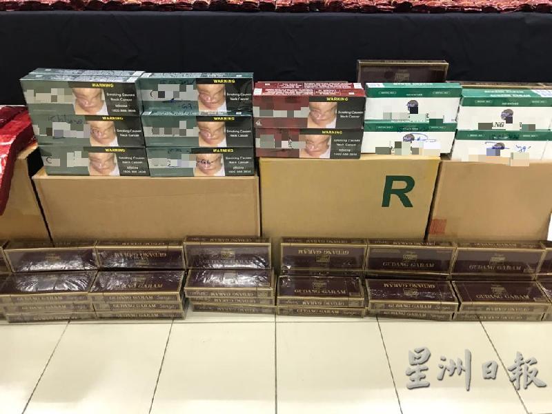 警方起获471盒各牌子香烟。