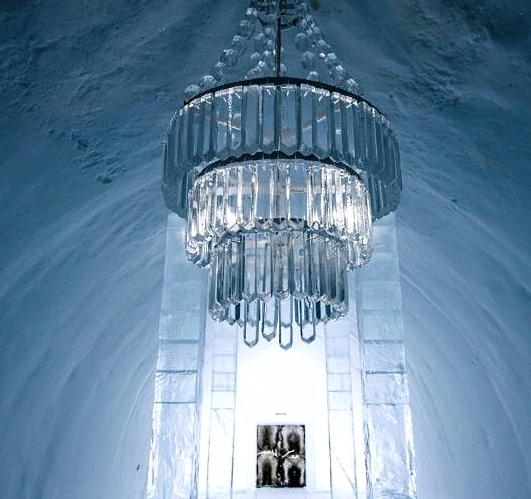 An ice chandelier hanging in the main hall of the ice hotel. AFP