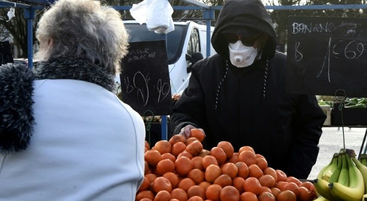 Greengrocers are keeping their distance, as well as their customers. AFP