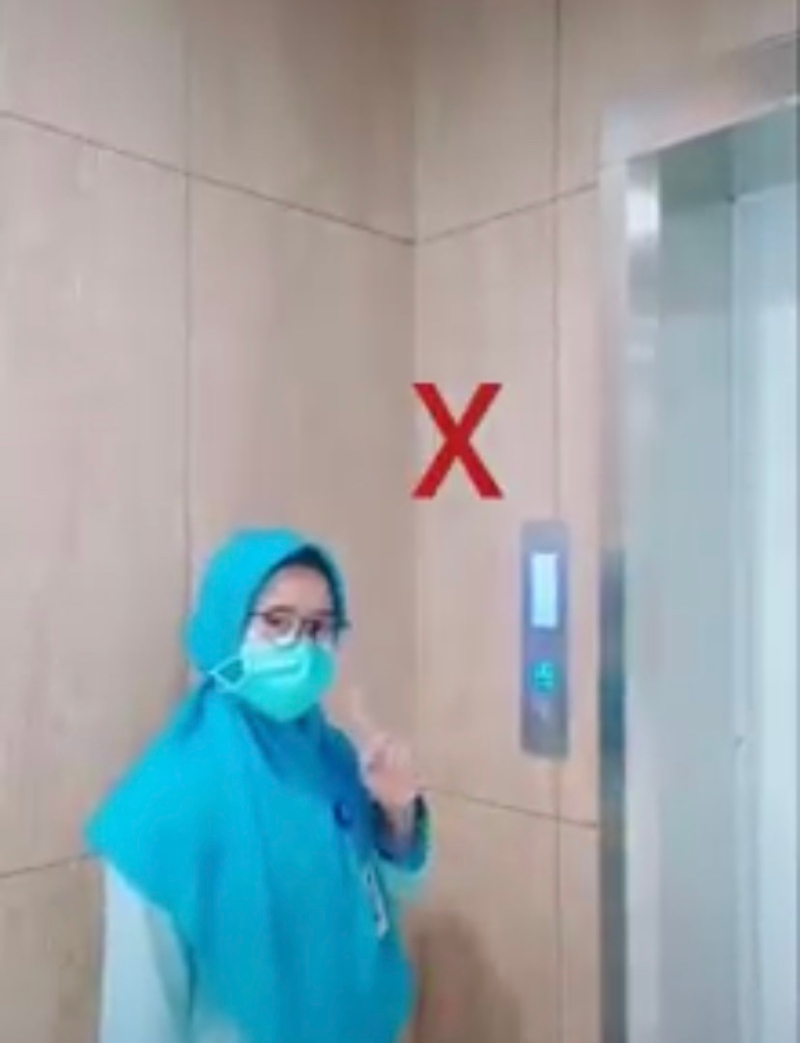 不用手指按电梯按钮。