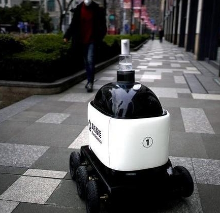 A robot with a dispenser for hand sanitiser in Shanghai.