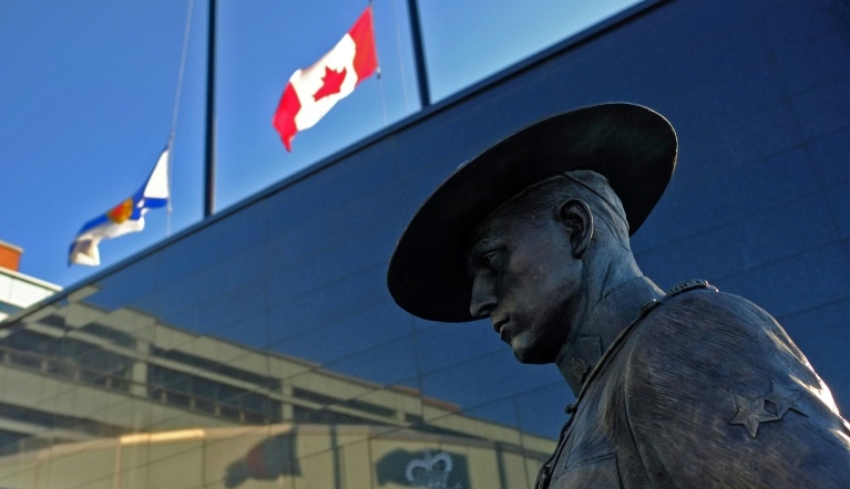 Flags of Nova Scotia and Canada fly at half-staff outside the Nova Scotia Royal Canadian Mounted Police headquarters in Dartmouth after the shooting rampage. AFP Flags of Nova Scotia and Canada fly at half-staff outside the Nova Scotia Royal Canadian Mounted Police headquarters in Dartmouth after the shooting rampage. AFP