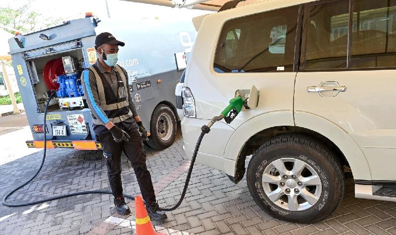 The app will send a driver with a mini-tanker to fill up the customer's car. AFP The app will send a driver with a mini-tanker to fill up the customer's car. AFP