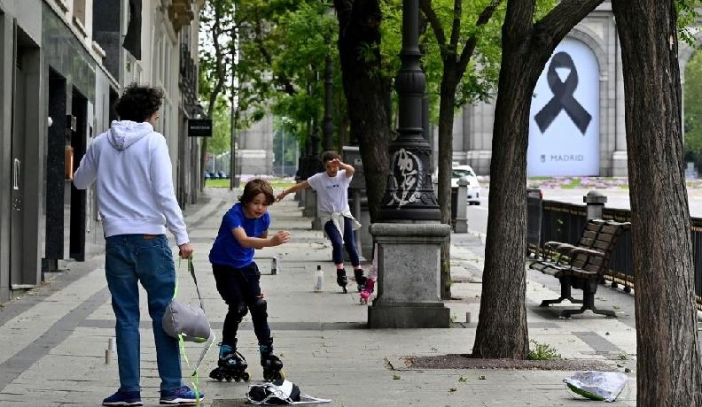 Children reclaim the streets of Madrid after a 6-week lockdown was lifted on Sunday. AFP Children reclaim the streets of Madrid after a 6-week lockdown was lifted on Sunday. AFP