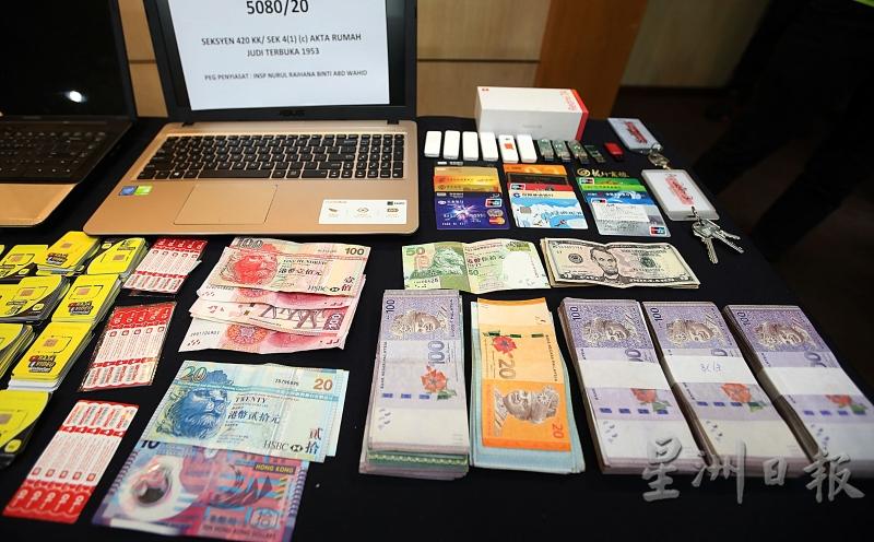 警方在行动中起获价值3万8000令吉的各国货币。