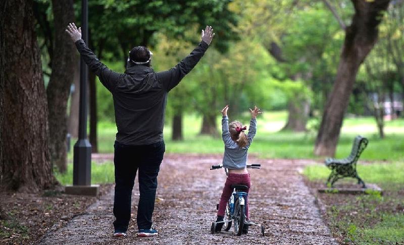 From Sunday a maximum of three children under 14 years can go out once a day for one hour accompanied by one parent. AFP From Sunday a maximum of three children under 14 years can go out once a day for one hour accompanied by one parent. AFP
