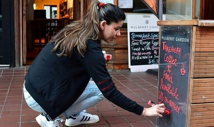 Coffee lovers indulge in barista-brewed beverages after more than a month of strict quarantine measures. AFP Coffee lovers indulge in barista-brewed beverages after more than a month of strict quarantine measures. AFP