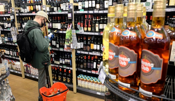 Bottles of alcohol for sale at a supermarket in Moscow. AFP Bottles of alcohol for sale at a supermarket in Moscow. AFP