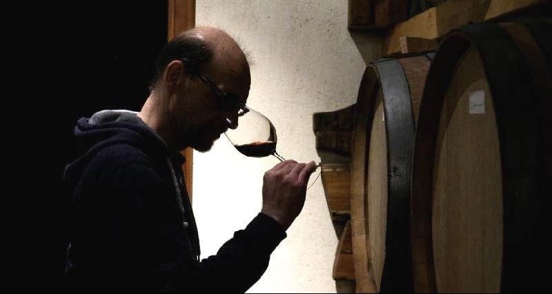 Stefano Cagliero, owner of Cagliero's Winery, contemplates the nose on a glass in his cellar. AFP Stefano Cagliero, owner of Cagliero's Winery, contemplates the nose on a glass in his cellar. AFP