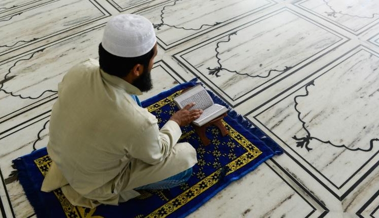 Fake and dubious videos have proliferated showing Indian Muslims licking fruit for sale and violating lockdown rules. AFP Fake and dubious videos have proliferated showing Indian Muslims licking fruit for sale and violating lockdown rules. AFP