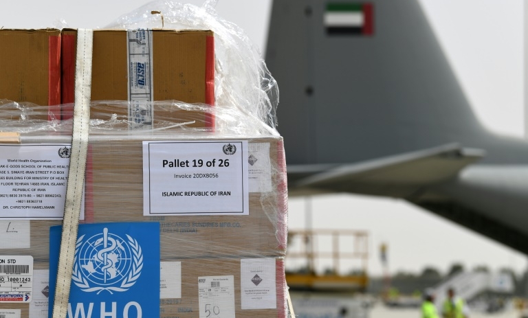 UAE sent a military plane carrying UN medical experts and aid to Iran despite tensions. AFP