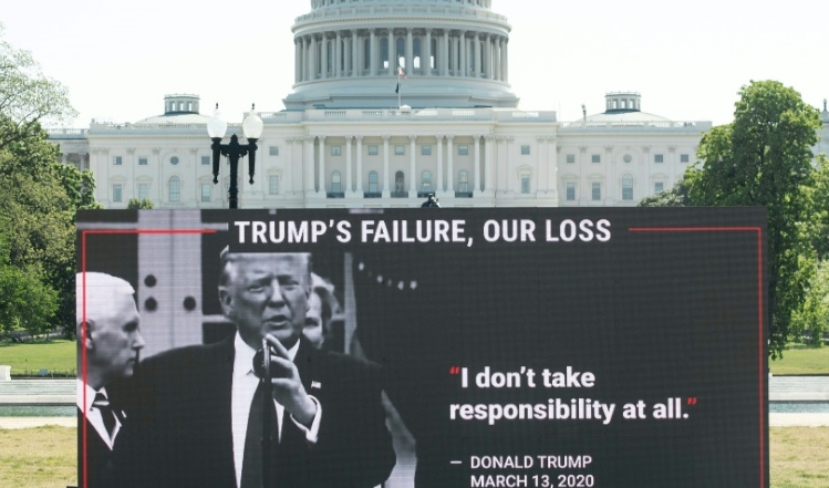 MoveOn.org stages a protest against Trump's handling of the COVID-19 pandemic outside the US Capitol in Washington, DC. AFP MoveOn.org stages a protest against Trump's handling of the COVID-19 pandemic outside the US Capitol in Washington, DC. AFP