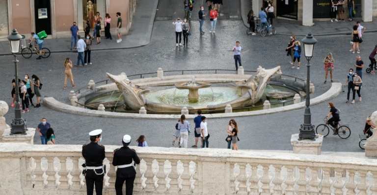 Police keep watch near the Spanish Steps at Piazza di Spagna in Rome. AFP Police keep watch near the Spanish Steps at Piazza di Spagna in Rome. AFP