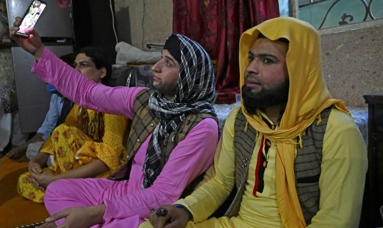 Transgender people gather to break their fast during the Islamic holy month of Ramadan in Rawalpindi. AFP