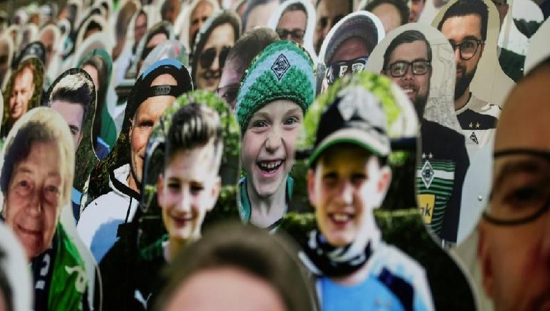 Life-sized images of fans have been placed at Borussia Moenchegladbach's stadium in Germany. AFP