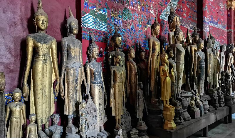 Statues of Buddha inside a Luang Prabang temple. SIN CHEW DAILY