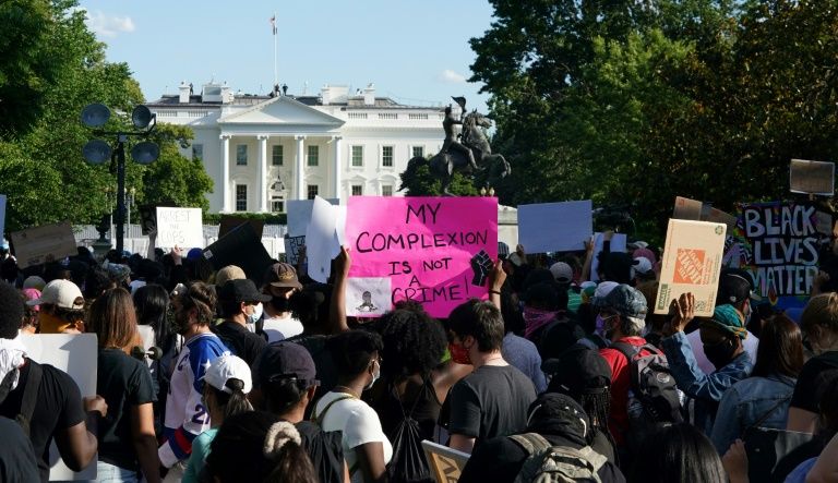 Demonstrators near the White House protest over the death of George Floyd. AFP