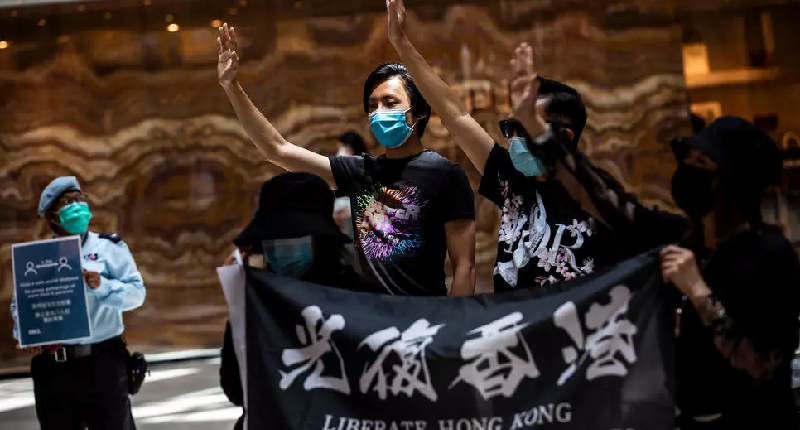 Pro-democracy protesters gather during a rally at a shopping mall in Hong Kong. AFP