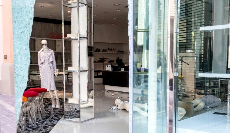 A trashed Michael Kors store at the Grove Mall in Los Angeles. AFP