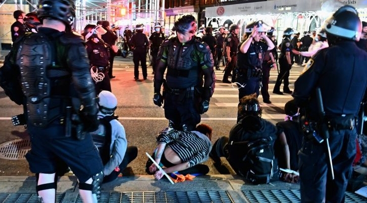 Suspected looters arrested after curfew takes effect in New York. AFP