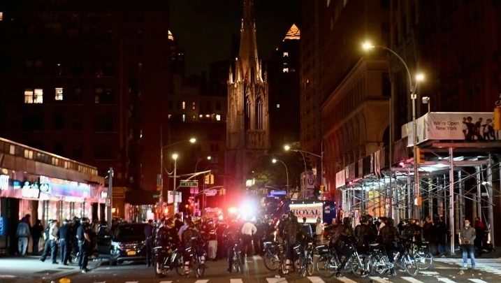 Police officers deployed during a curfew in New York. AFP