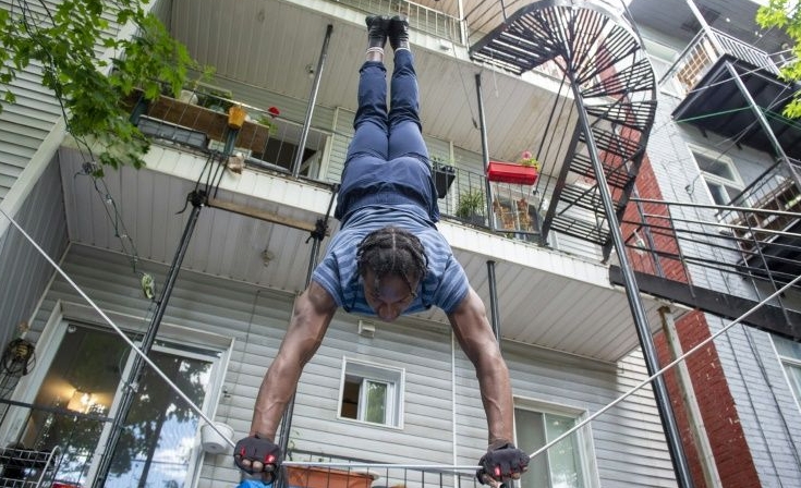 Antino Pansa trains in the courtyard of his apartment in Montreal. AFP
