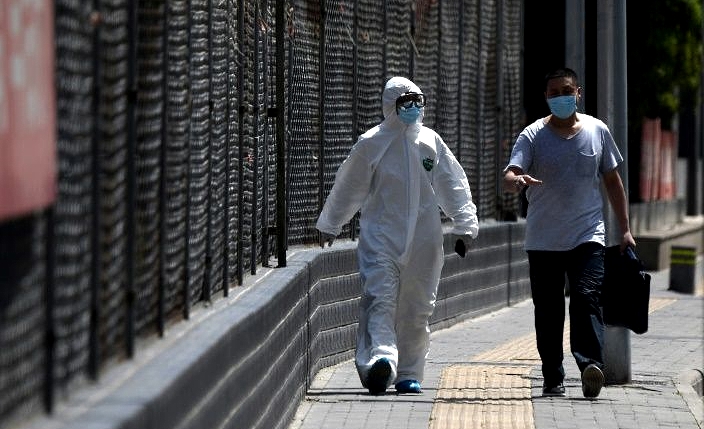 The city has begun mass testing workers from the Xinfadi food market. AFP