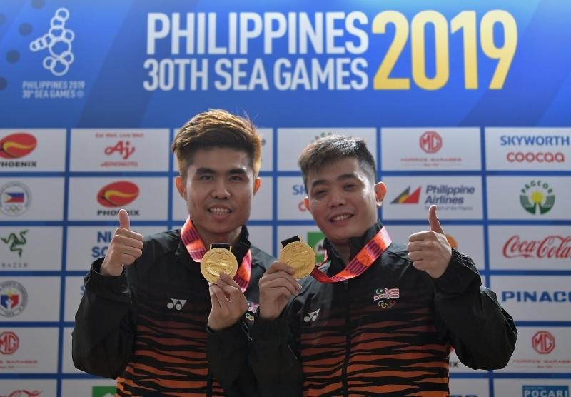大马台球与撞球队向来在东运会保持竞争力，去年的菲律宾东运会也靠莫景皓（右）与林国良夺得男子双人赛金牌。（档案照）