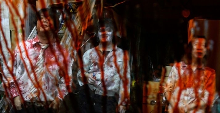 A drive-in haunted house in Japan has made performances coronavirus compatible. AFP