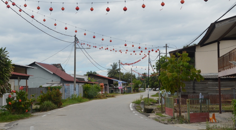 峇都交湾传统村貌朴素，与另一端的卫星市面貌天渊之别。
