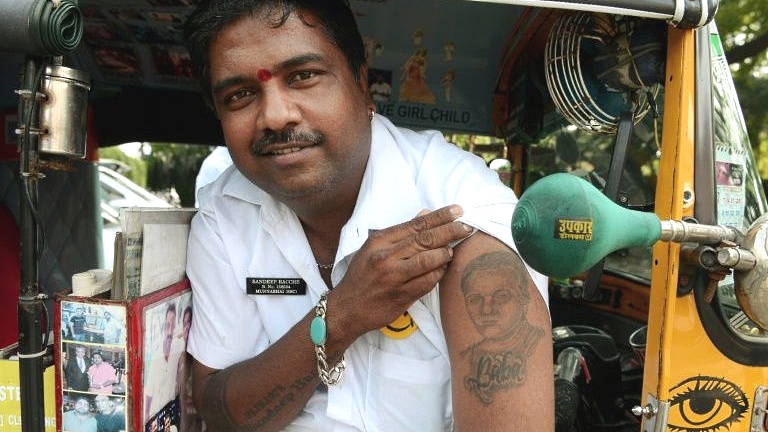Mumbai rickshaw driver Sandeep Bacche is a Bollywood enthusiast. AFP