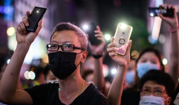 After the law came in, many Hong Kongers took to Twitter and other social media platforms to announce their departure or share tips on internet safety. AFP
