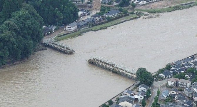 The floods washed away many bridges. AFP