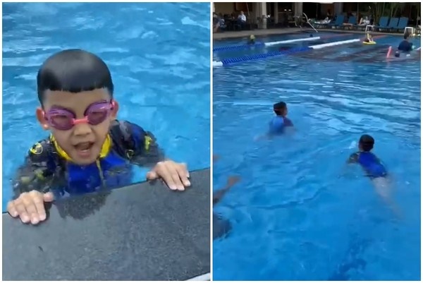5岁的飞飞与翔翔已经能自己自在游泳。