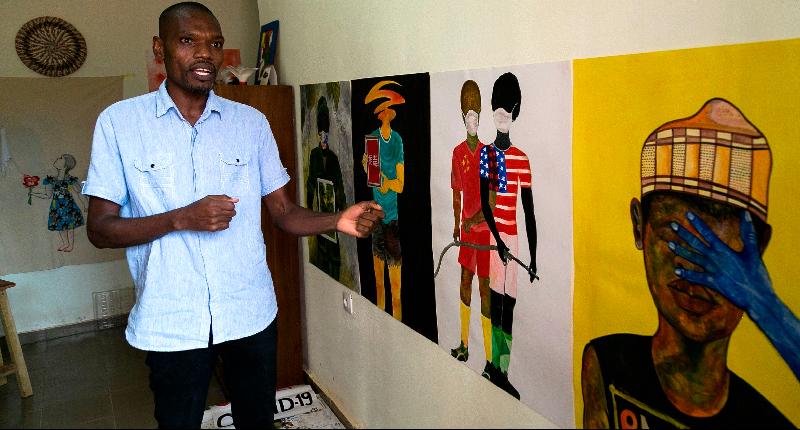 Young Cameroonian artist Alioum Moussa has since March been broadcasting his paintings online about the ravage of the COVID-19 outbreak with more than a hundred works from the series 