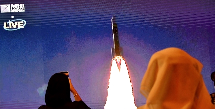 Staff at Mohammed Bin Rashid Space Center in Dubai follow the broadcast launch of the Staff at Mohammed Bin Rashid Space Center in Dubai follow the broadcast launch of the