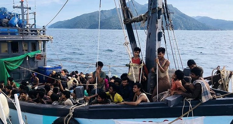 A boat carrying Rohingya refugees reaches Malaysian territorial waters off Langkawi. AFP