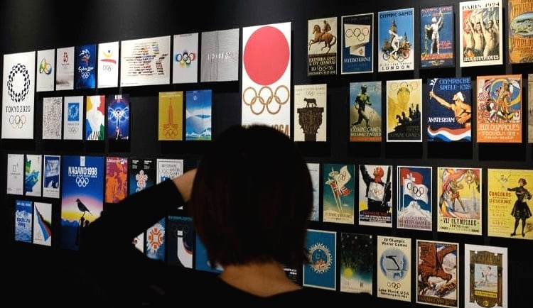 A visitor takes pictures at the Japan Olympic Museum in Tokyo. AFP A visitor takes pictures at the Japan Olympic Museum in Tokyo. AFP