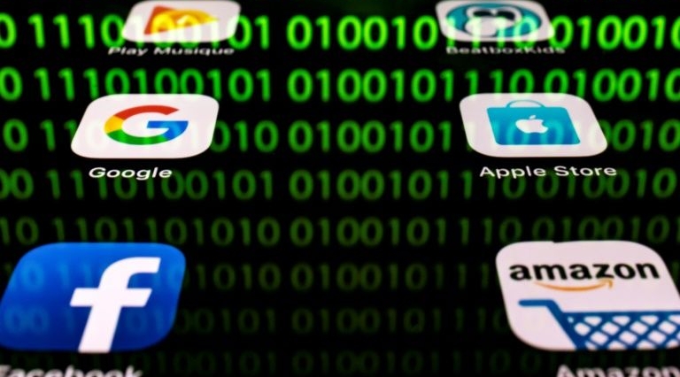The pandemic has highlighted the importance of Big Tech firms in providing key services but also has drawn attention to their dominance in key economic sectors. AFP