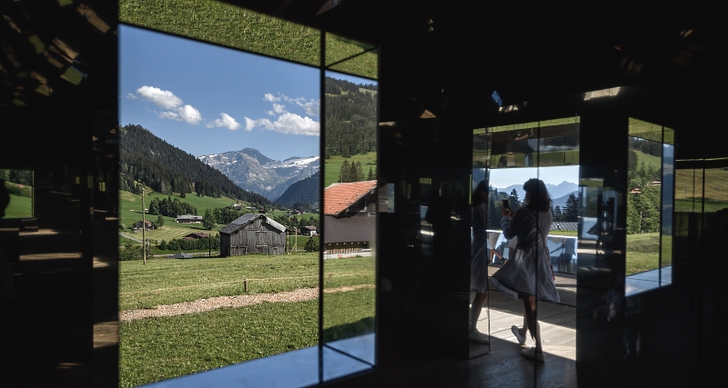 View from inside "Mirage Gstaad", a sculpture by Los Angeles-based artist Doug Aitken representing a chalet made with mirrors reflecting the Alpine landscape of the Berner Oberland area in Schonried near Gstaad. AFP